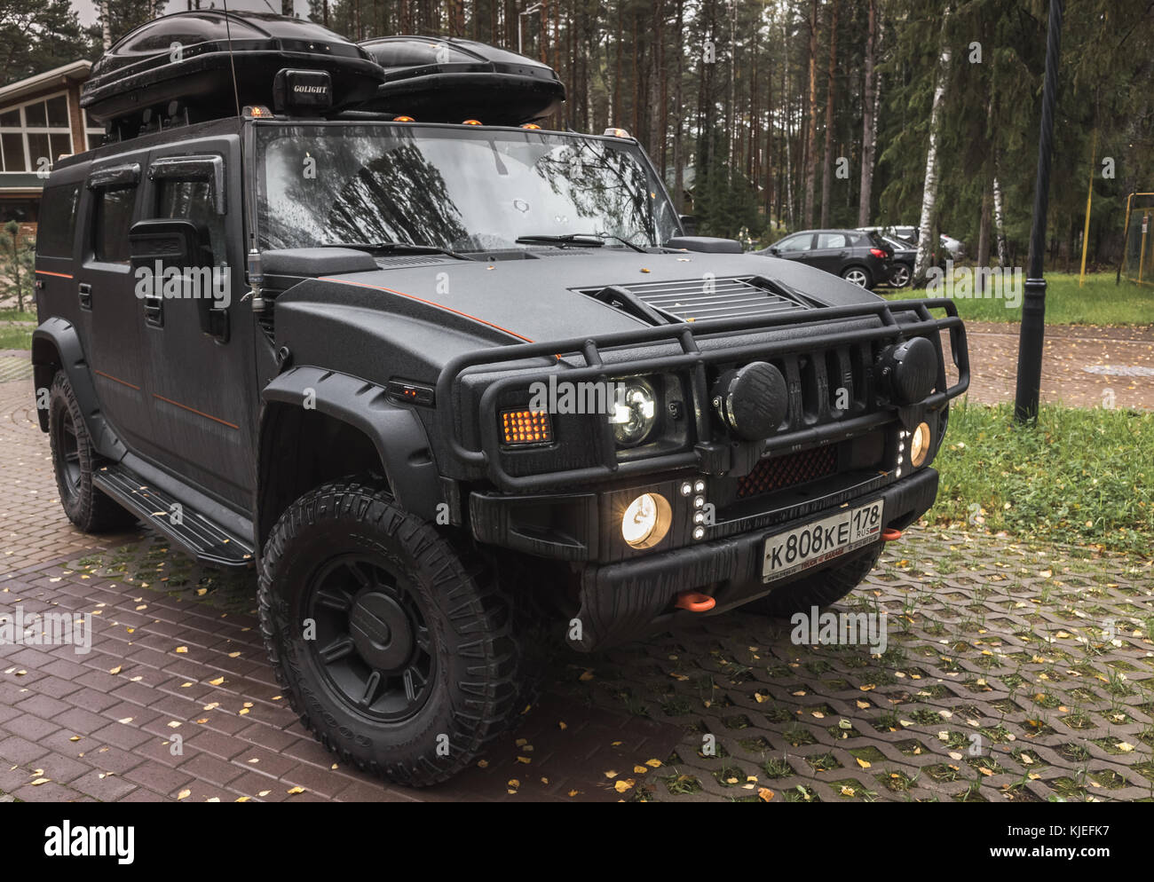 Saint-Petersburg, Russia - October 8, 2017: Black Hummer H2 car stands on rural parking Stock Photo