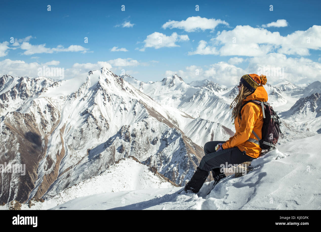 Outdoor Girl Is Sitting On The Top Of Mountain And Enjoying The View Stock Photo Alamy