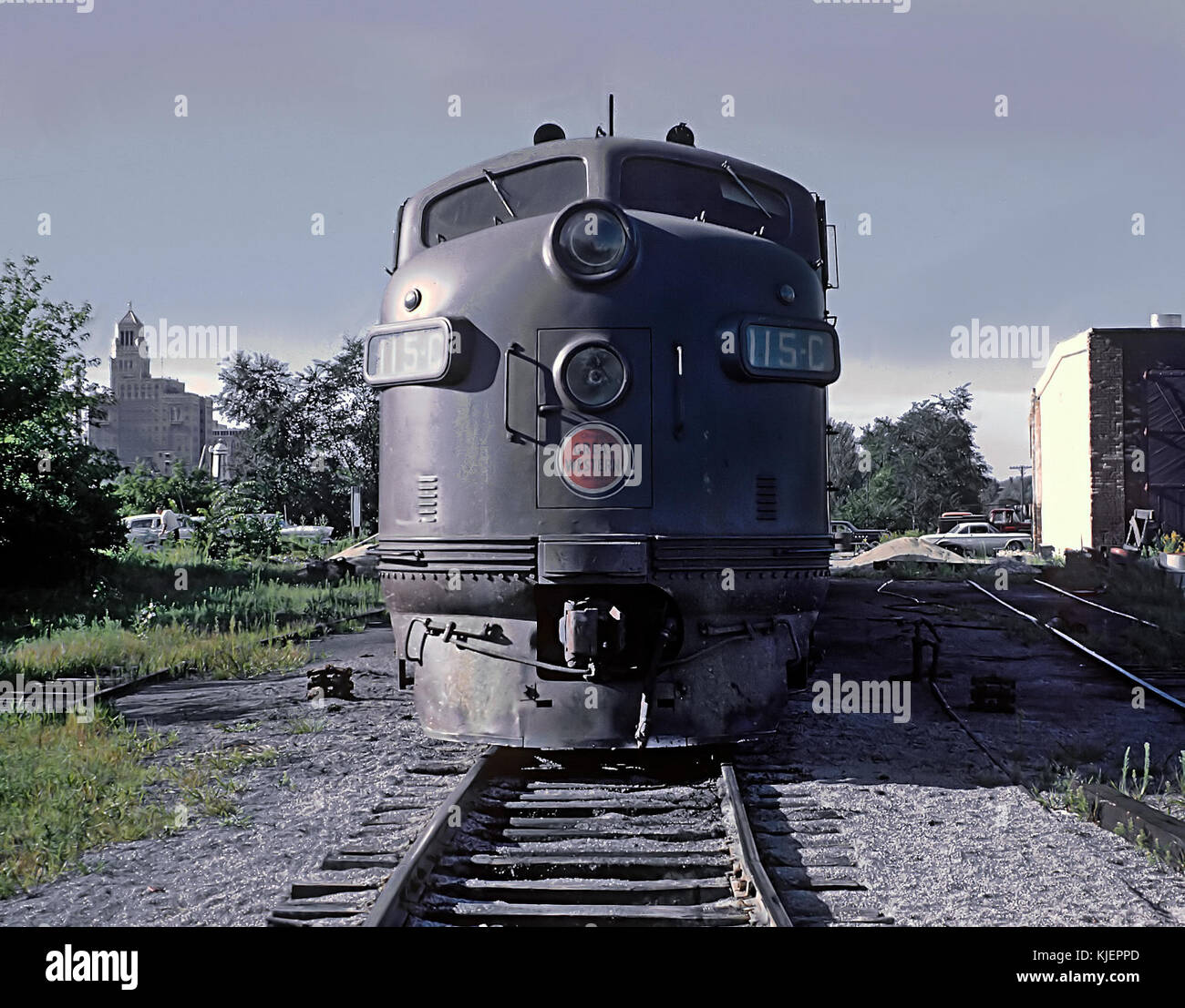 CGW 115 C (F5A) on ready track in yard at Roschester, MN. Roundhouse is at extreme right and the main building of the Mayo Clinic can be seen the left. August 7, 1962 (22428536722) Stock Photo