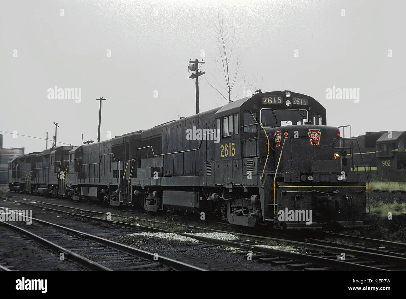 PRR 2615 (U25B) in yard at Logansport, IN Note TP&W unit at extreme right on November 25, 1966 (22337989280) Stock Photo