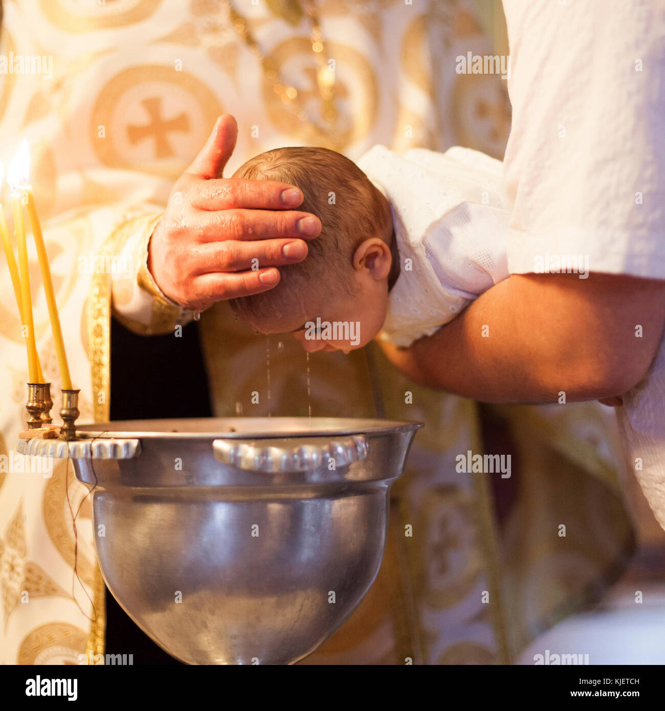 Caucasian baby girl being baptized Stock Photo Alamy