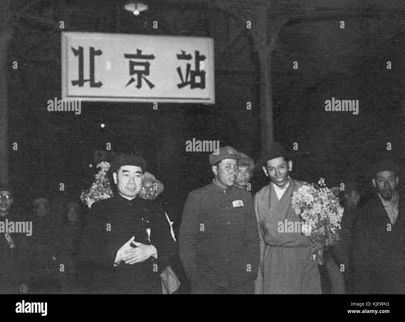 Zhou Enlai, the Premier of the People's Republic of China, is depicted with deputies from the Tibetan local government. The image reflects the political relations between China and Tibet during the mid-20th century. Stock Photo
