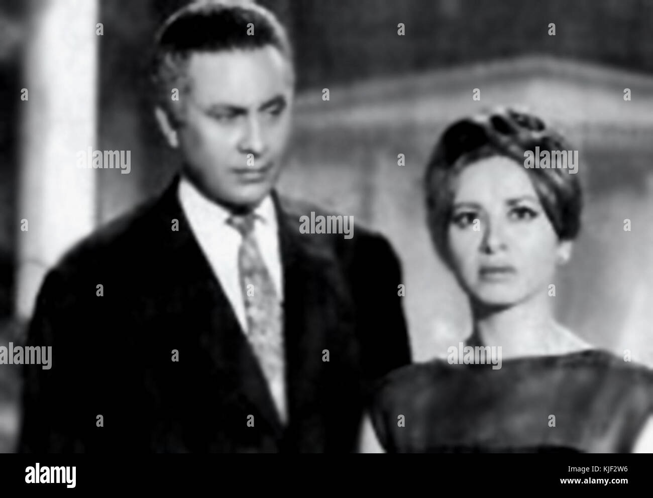 A photograph or image of Mahmoud Mursi and Faten Hamama, both influential figures in Egyptian cinema, known for their roles in film and television. Stock Photo