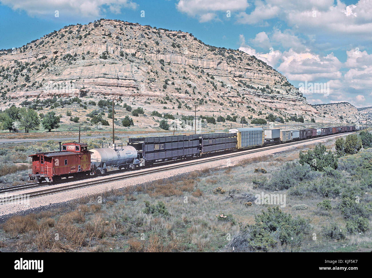AT&SF caboose 999220 on aa eastbound at Lupton, AZ viewed from I 40 in ...