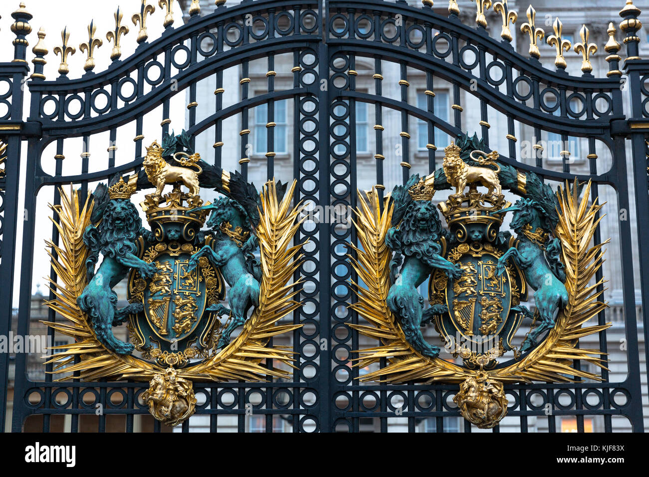Detail shot of the gates at Buckingham Palace showing Royal Coat of Arms - London, UK Stock Photo