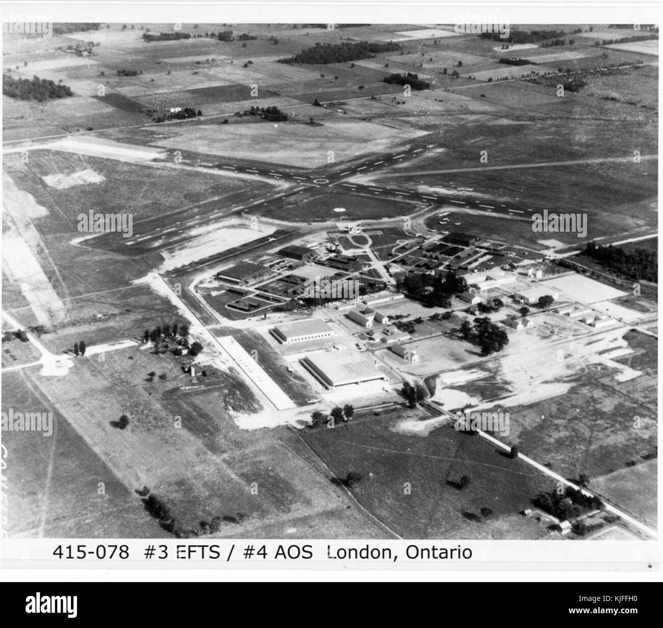 This aerial view, taken in the 1940s, shows Crumlin, Ontario, in Canada. It depicts the landscape during the era of the Royal Canadian Air Force (RCAF), providing insight into the region during World War II. Stock Photo
