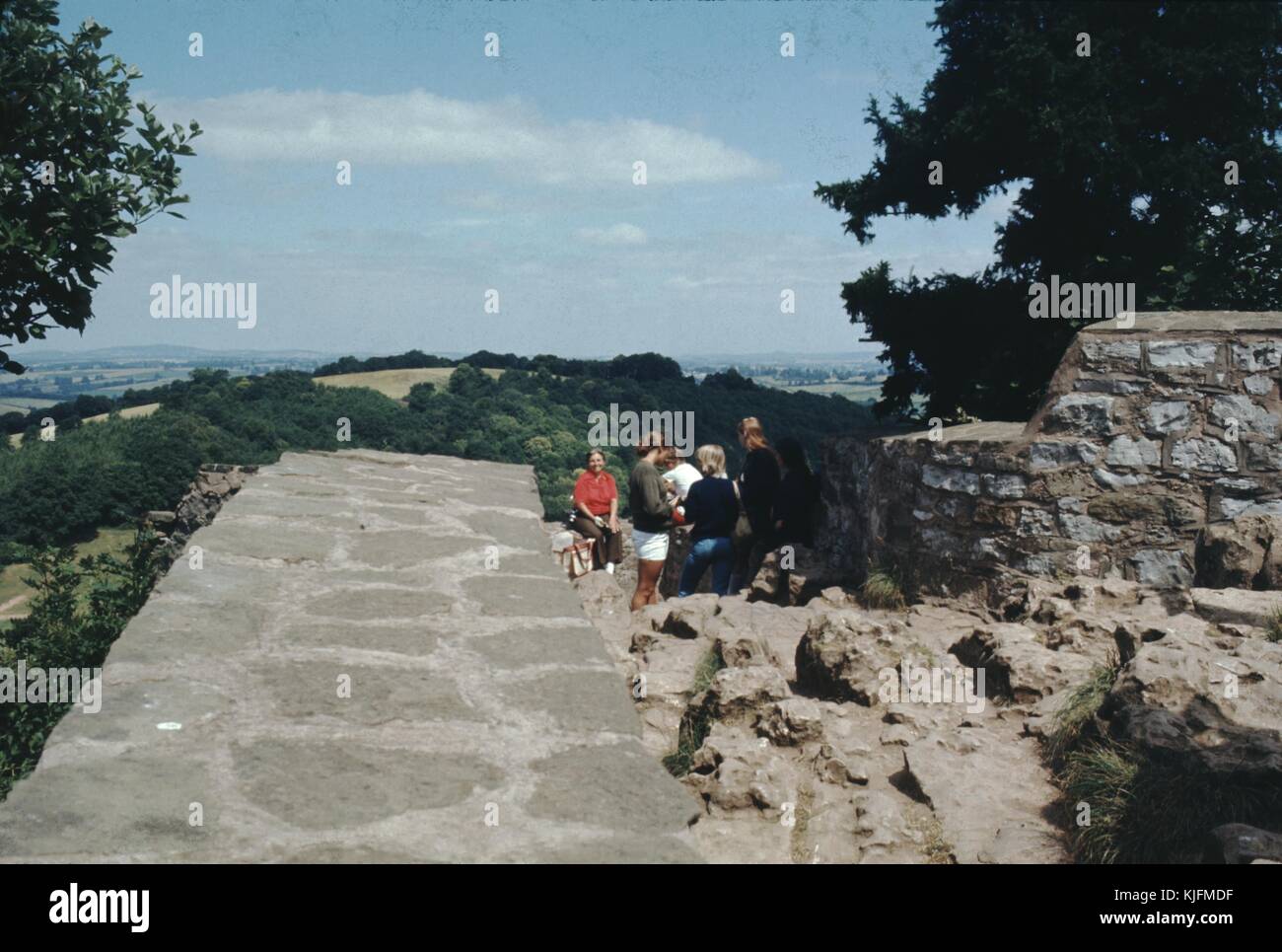 Vernacular snapshot photograph of wall and mountains, 1965. Stock Photo