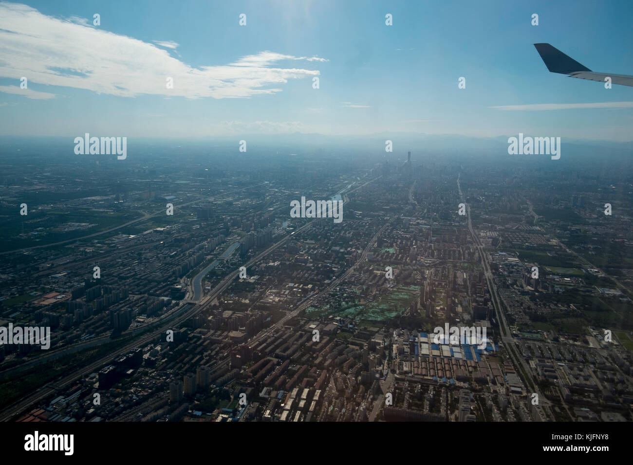 The urban sprawl of Beijing viewed from an aircraft Stock Photo