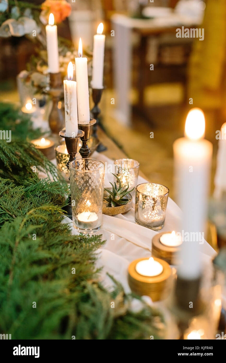 christmas, celebrating, dinner concept. lights of burning candles