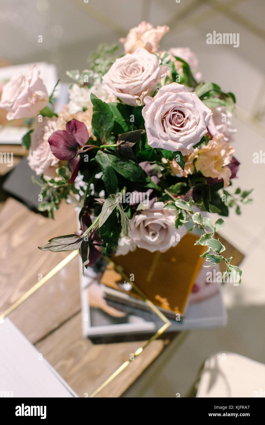 Floral Design Environment Wedding Decoration Concept Close Up Of Big Buds Of Light Ballet Pink Roses Collected In One Wonderful Bouquet With Green And Red Leaves Stock Photo Alamy