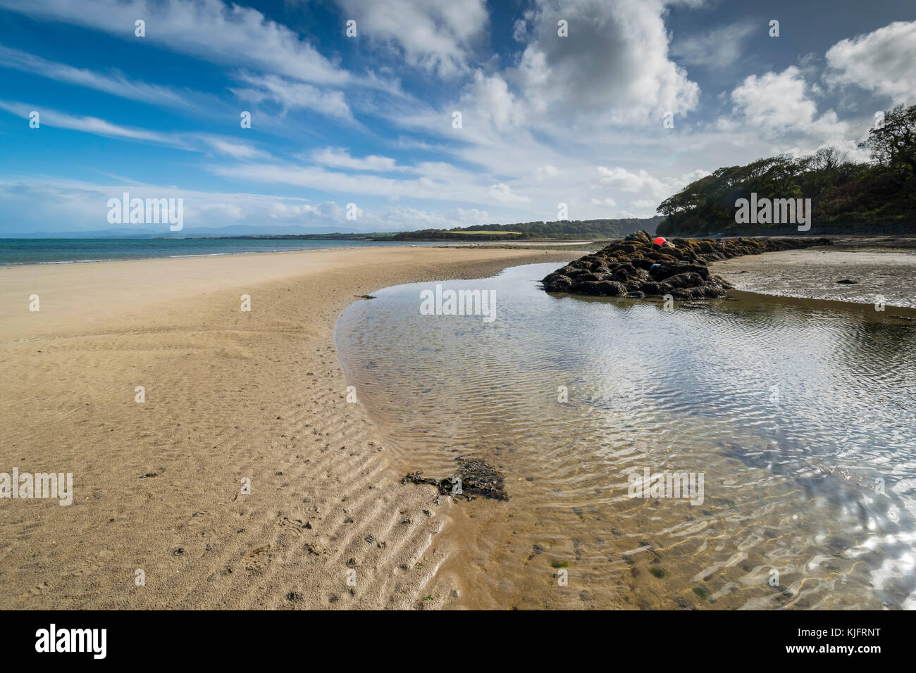 Portobello beach at Dulas Bay or Traeth Dulas near City Dulas on