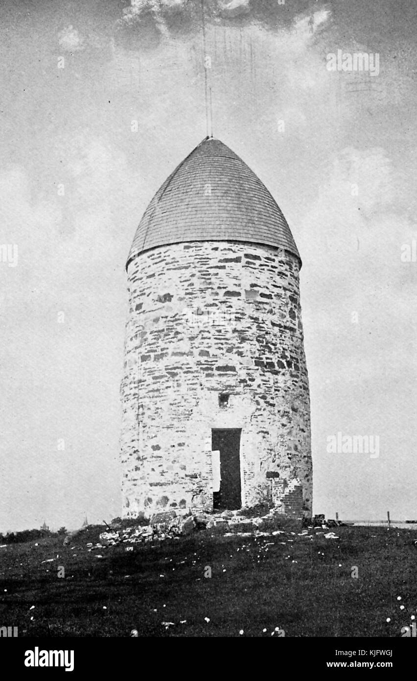 Photograph of the Old Powder House, the oldest stone building in Massachusetts, built for use as a windmill by John Mallet in 1703 or 1704, it was sold to the colonial government of Massachusetts for use as a gunpowder magazine in 1747, the removal of colonial gunpowder by British soldiers, is considered to be a turning point in the events leading up to the American Revolutionary War, Boston, Massachusets, Boston, Massachusetts, 1913. Stock Photo