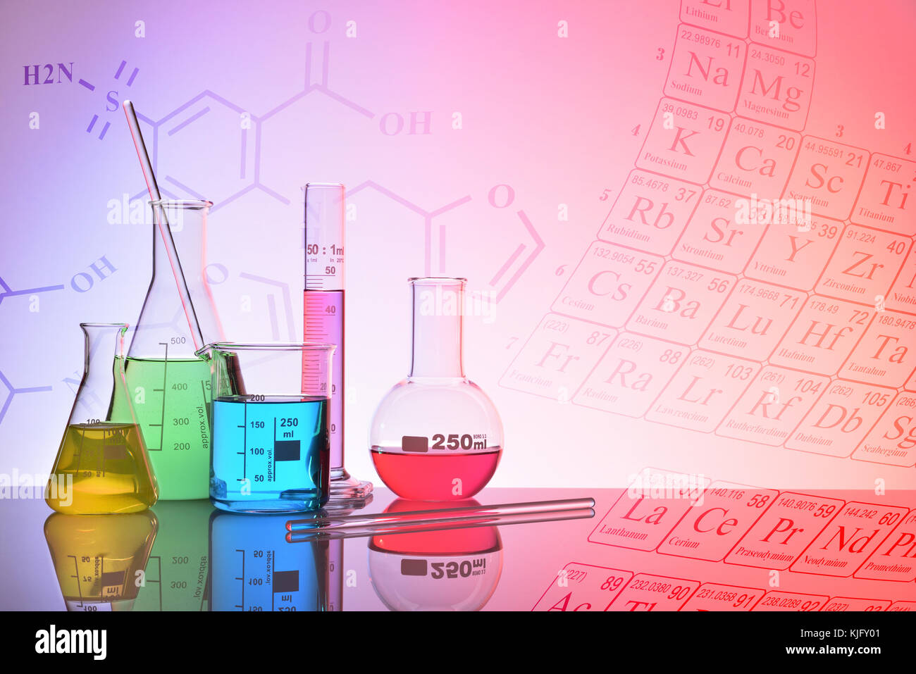 Laboratory glass chemical containers on glass table isolated colorful