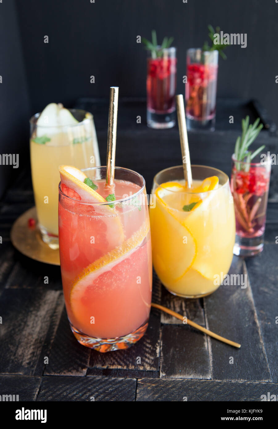 Variety of fruity cocktails on a dark background Stock Photo