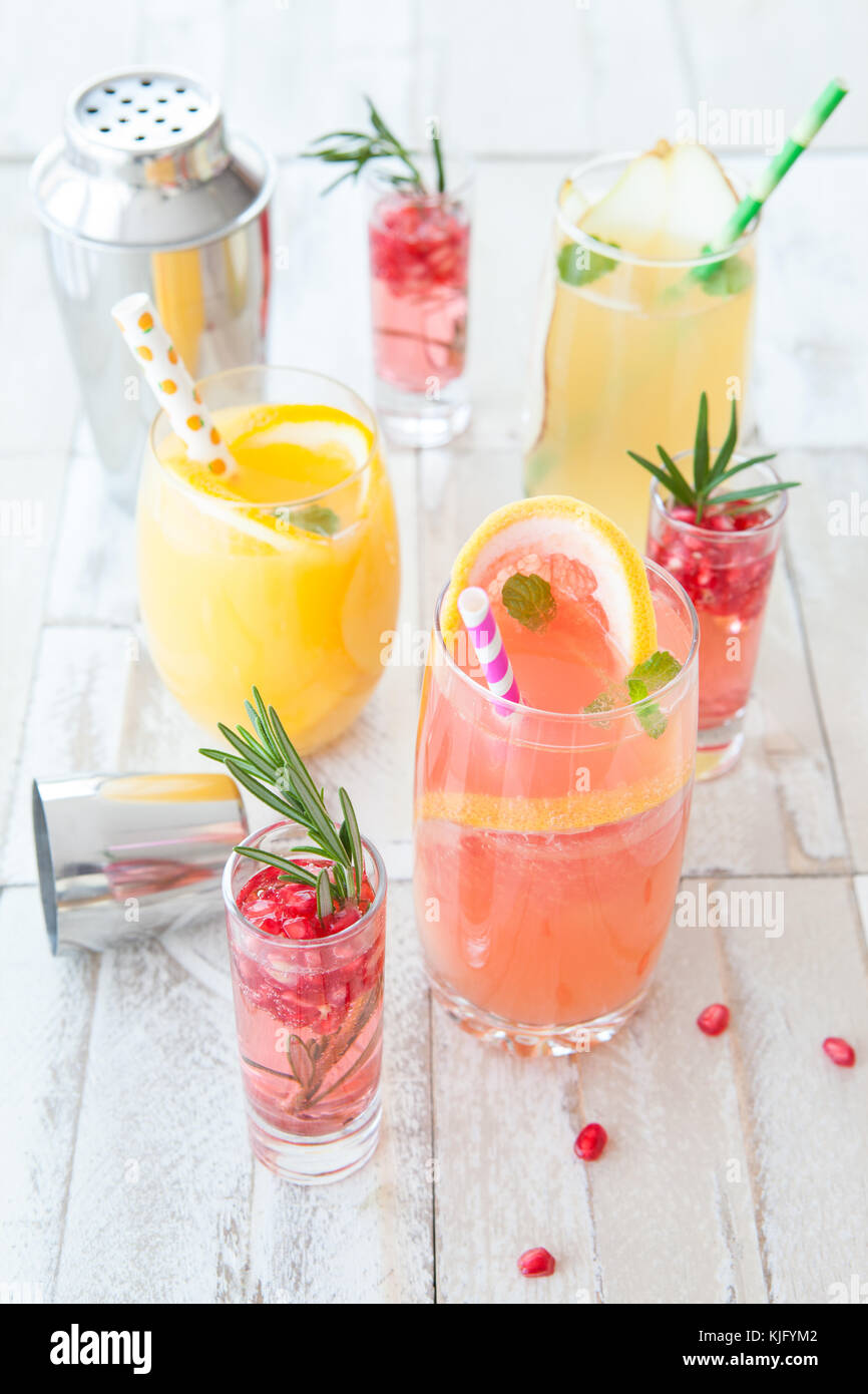 Variety of fruity cocktails on a wooden background Stock Photo