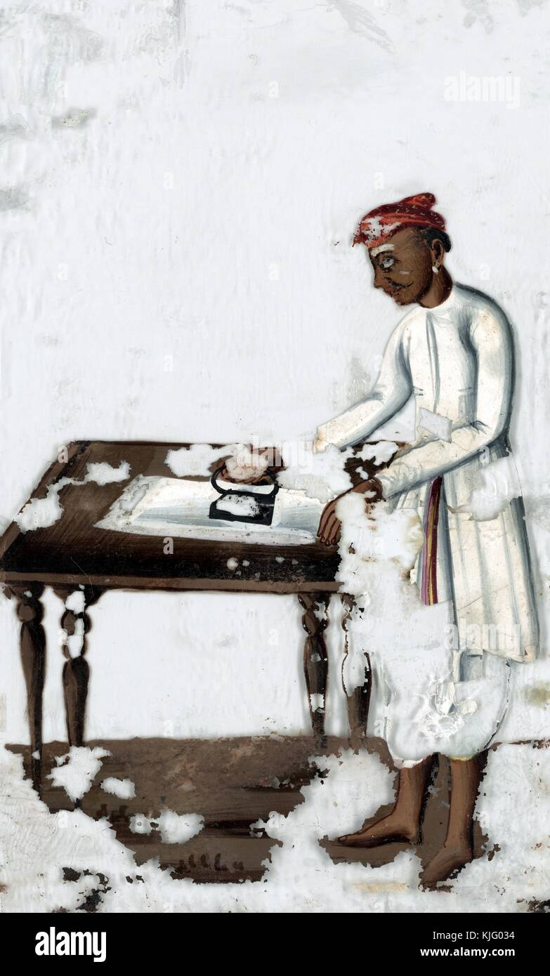 Man in white ironing at table, India, 1819. From the New York Public Library. Stock Photo