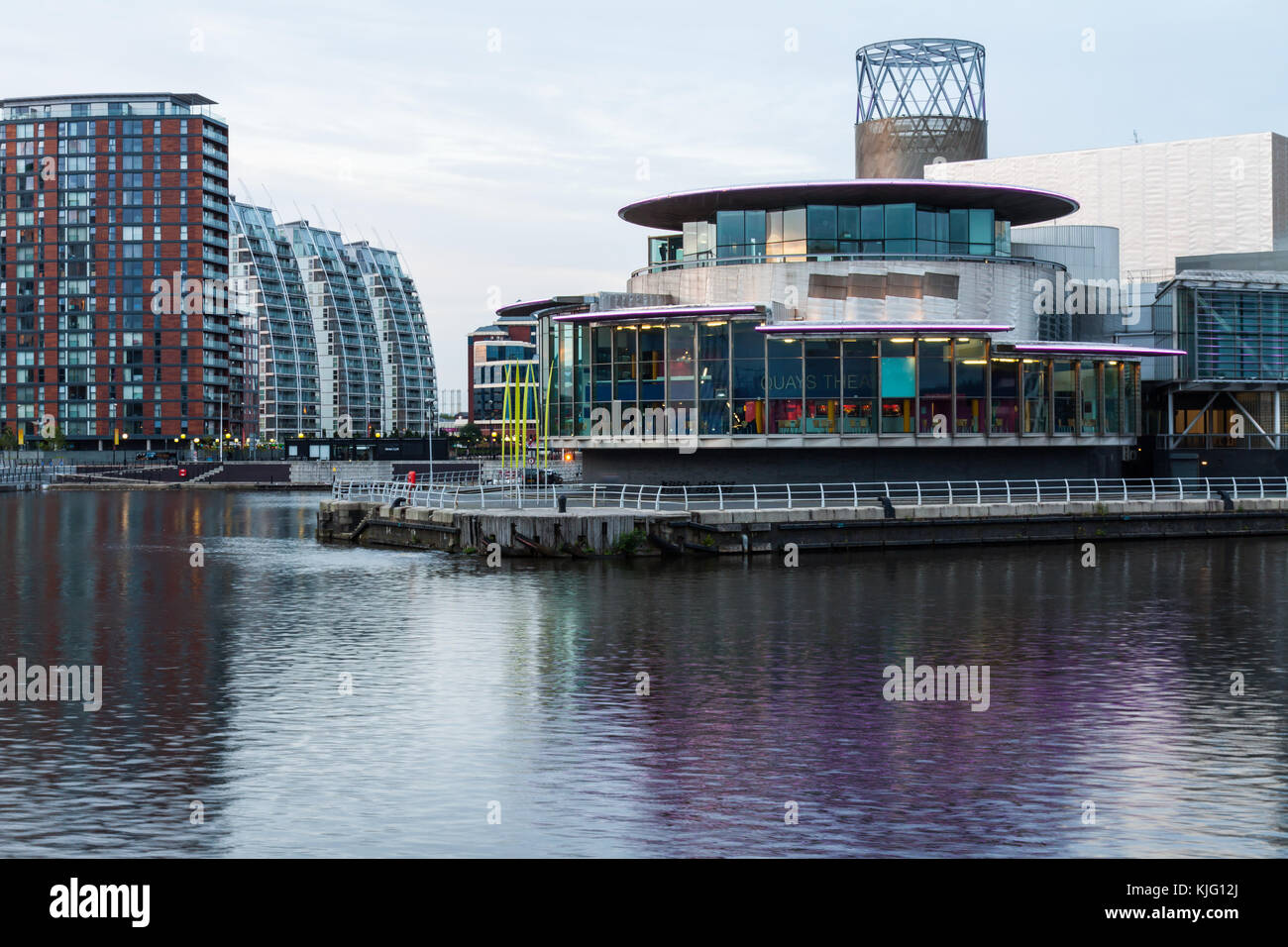 Image of the Lowry Theatres and Lowry Art Gallery taken from the Manchester Ship Canal at Salford Quays in the early evening. Stock Photo