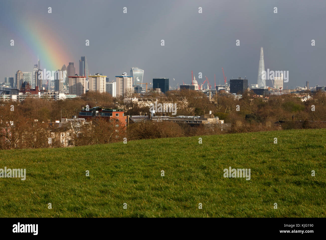 Rainbow over the City of London  from Primrose Hill, London, UK. Stock Photo