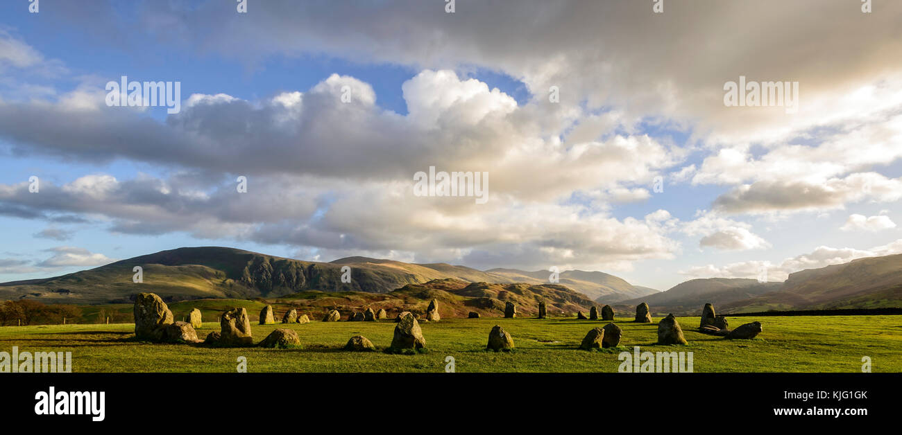 Panorama of Castlerigg stone circle in late autumn sunshine with Clough Head and Great Dodd in the background Stock Photo