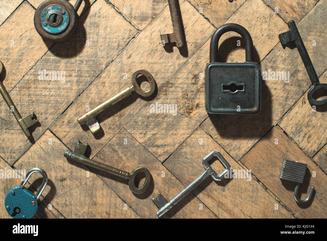 Old padlocks and keys on wood Stock Photo Alamy