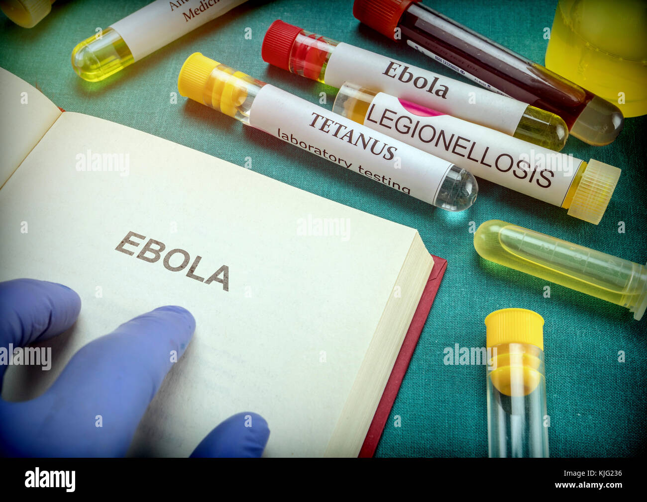 Doctor Take Open Book Of Ebola, Conceptual Image Stock Photo