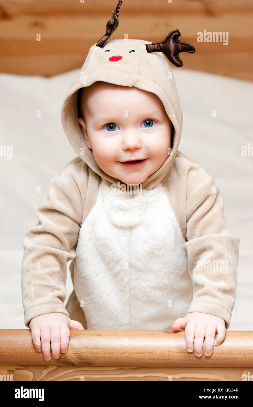 Little baby girl in deer costume Stock Photo - Alamy