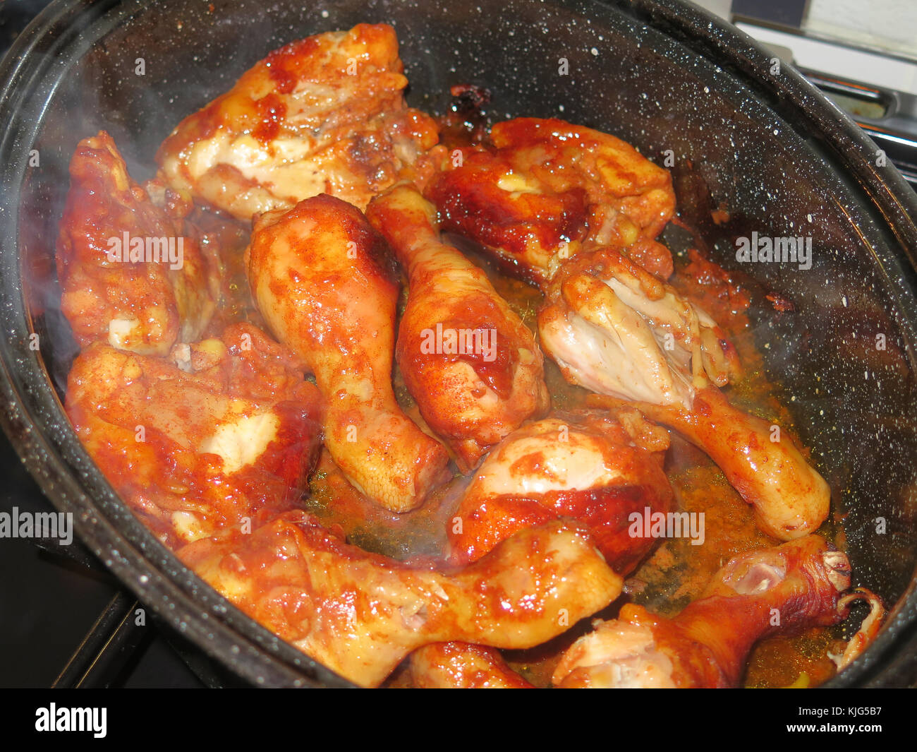 Chicken pieces in casserole dish Stock Photo Alamy
