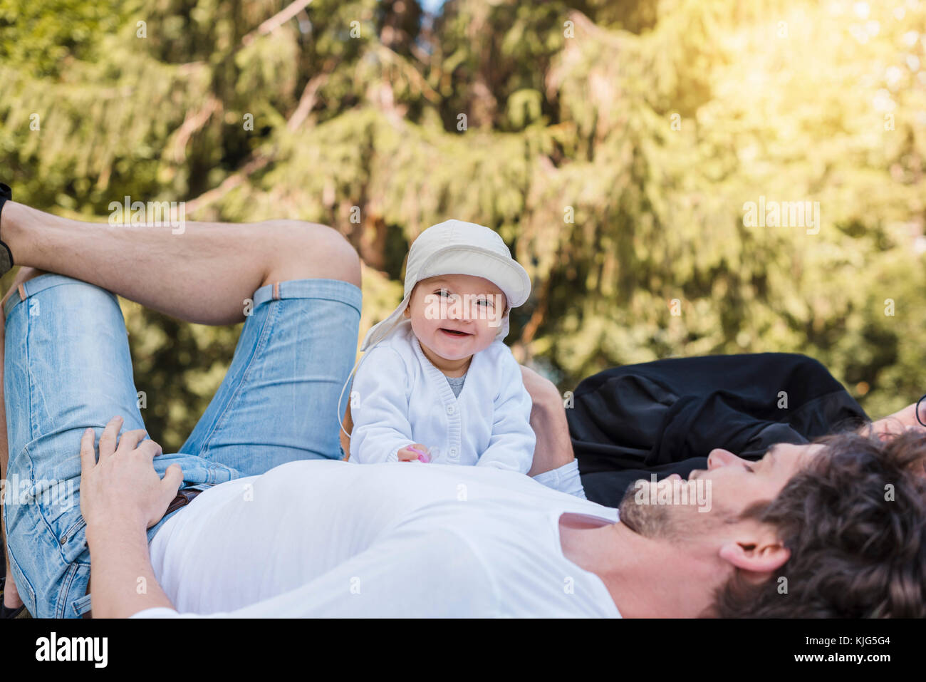 Happy father with baby girl in park Stock Photo - Alamy