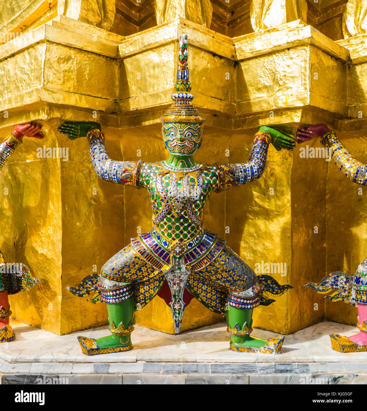Green demon guardian supporting Wat Arun Temple, Bangkok, Thailand Stock Photo