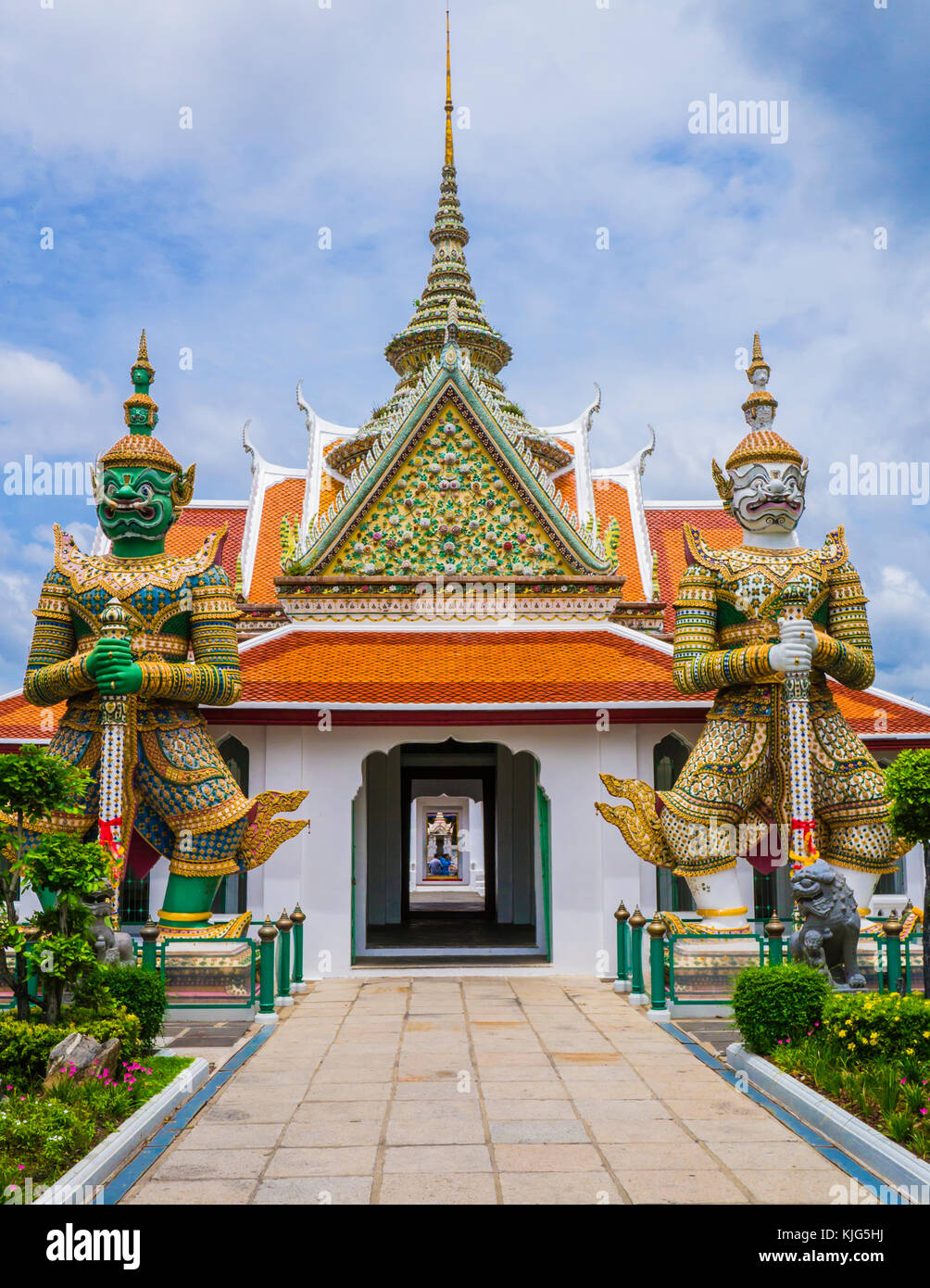 Entrance doorway to ordination hall with Yaksha guardians in the Wat Arun Temple, Bangkok, Thailand Stock Photo