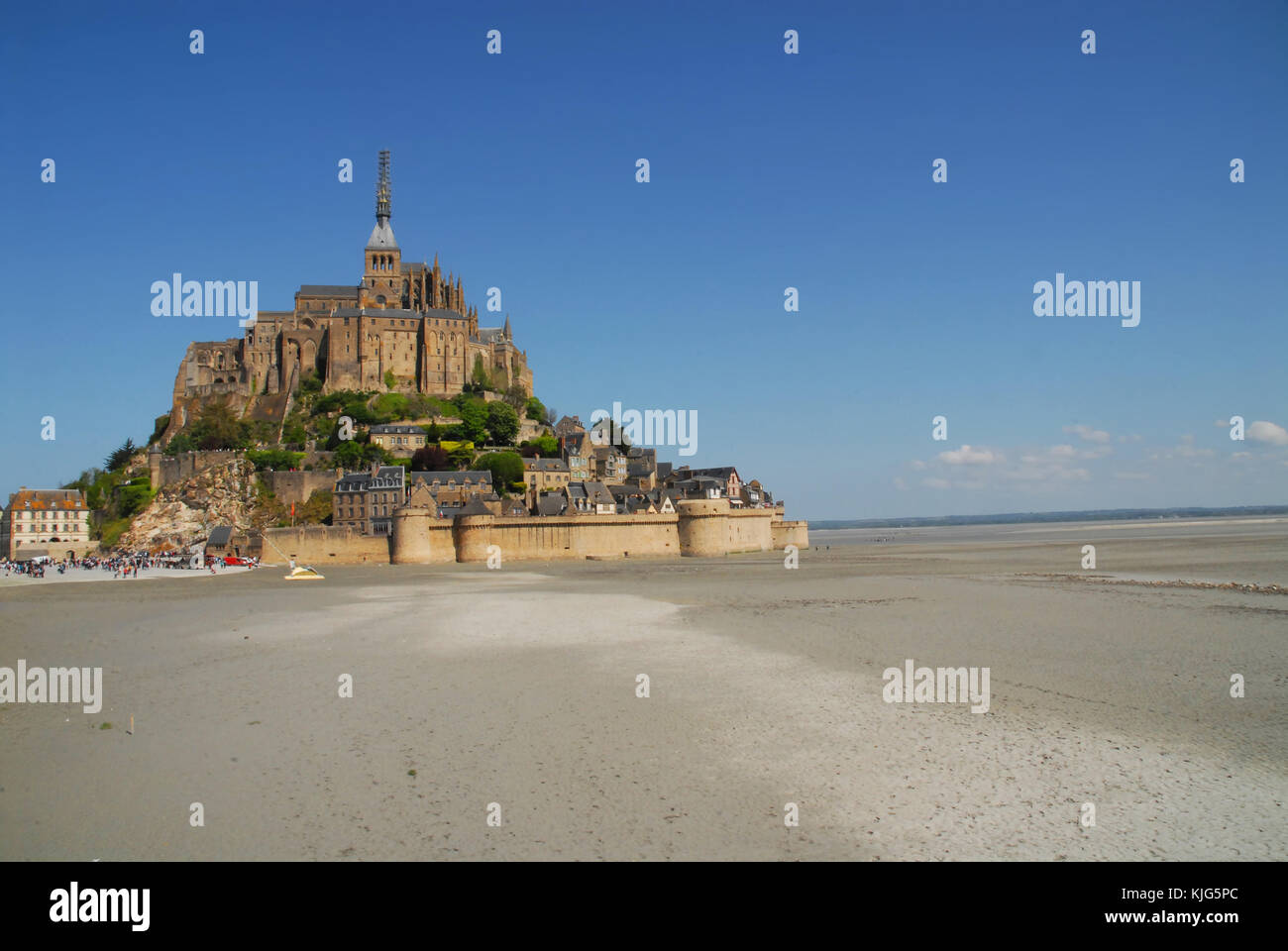 Le Mont Saint Michel seen from the sand at low tide Stock Photo