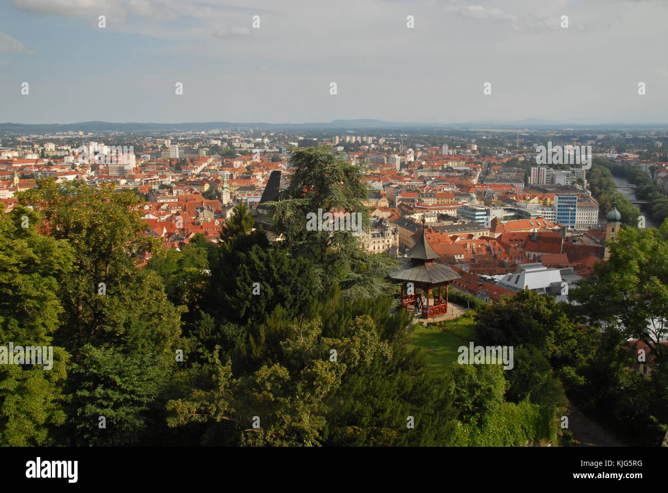 View of Graz and Schlossberg from Major-Hackher-Memorial during sunset Stock Photo