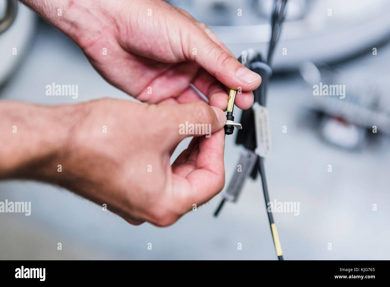 Close-up of man working at electronic component Stock Photo