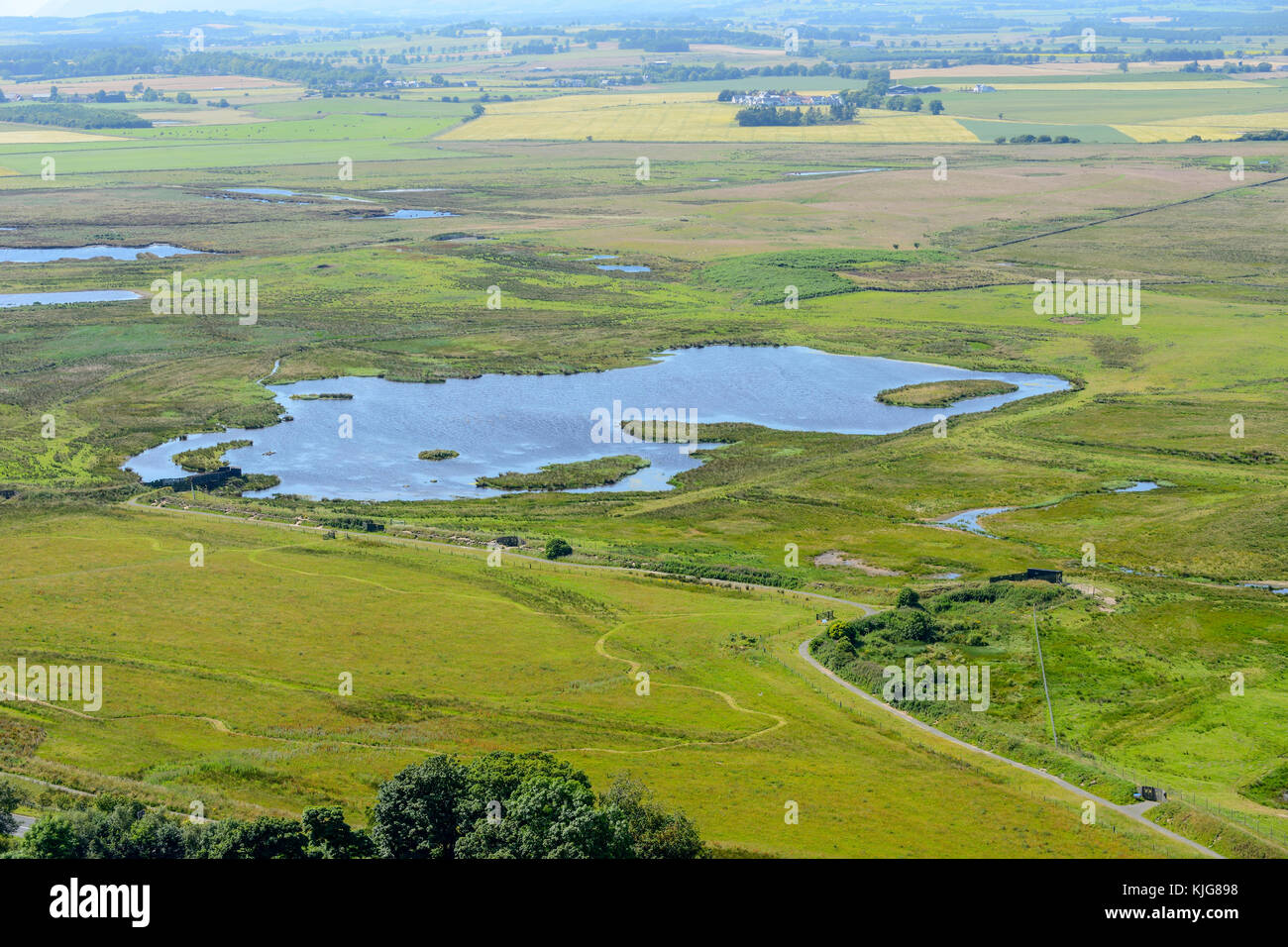 Aerial view of wetlands of RSPB Van Farm Nature Reserve on Loch Leven viewed from Benarty Hill, Perth and Kinross, Scotland Stock Photo