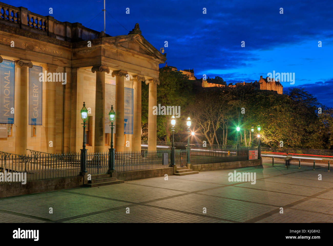 The national gallery and castle at dusk, Edinburgh, Lothian Stock Photo