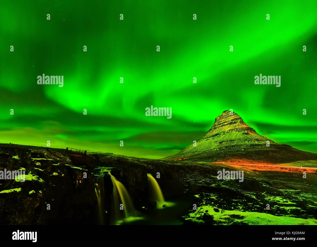 View of the northern light over Kirkjufell Mountain in Iceland. Stock Photo