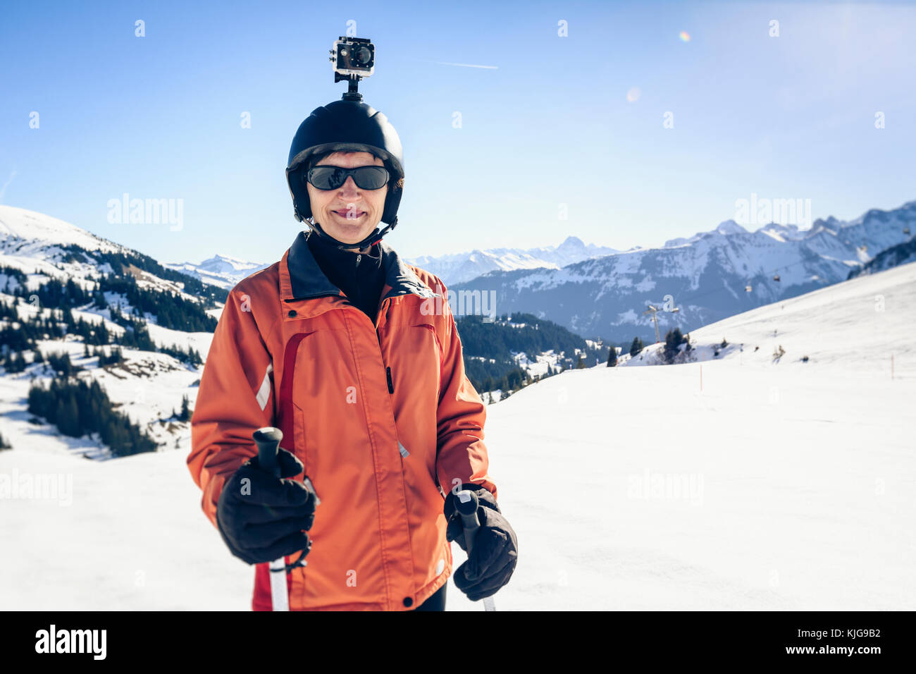 Austria, Damuels, skier with action cam in winter landscape Stock Photo