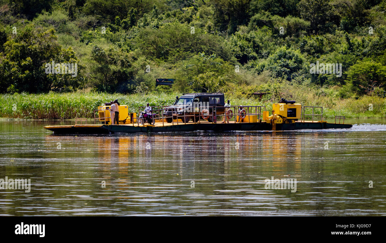 Ferry crossing the Nile river to bring the safari tourists to the other side in Murchison Falls national park in Uganda. Too bad this place, lake Albe Stock Photo