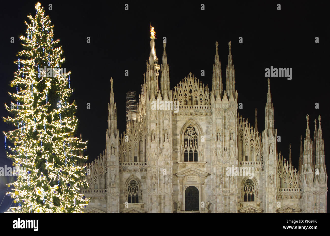 christmas tree and facade of the cathedral in december, in milan, Italy Stock Photo