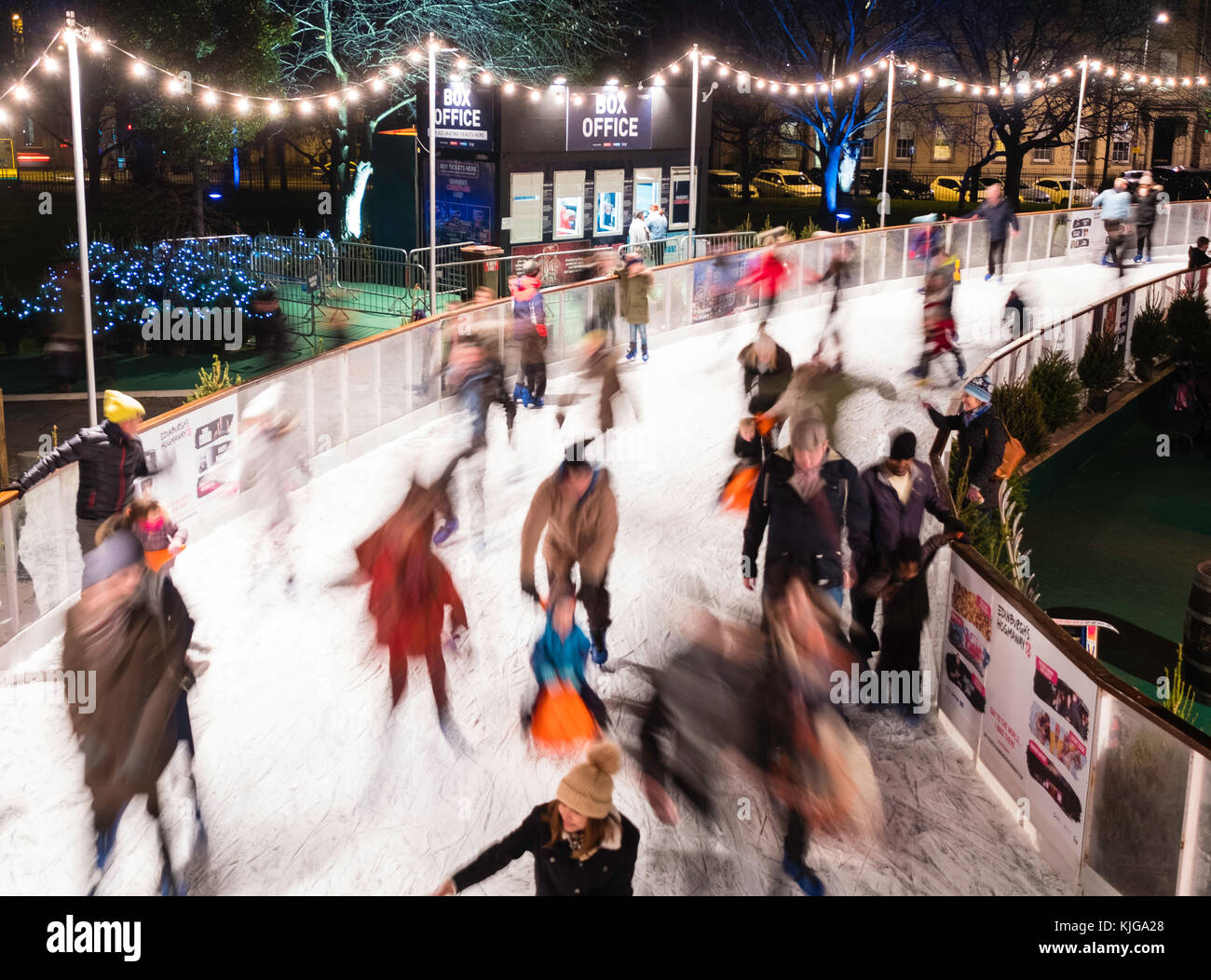 Ice skaters on ice rink in St Andrews Square in Edinburgh during the