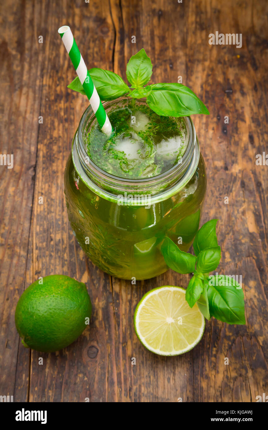Glass of organic lime lemonade with basil Stock Photo - Alamy