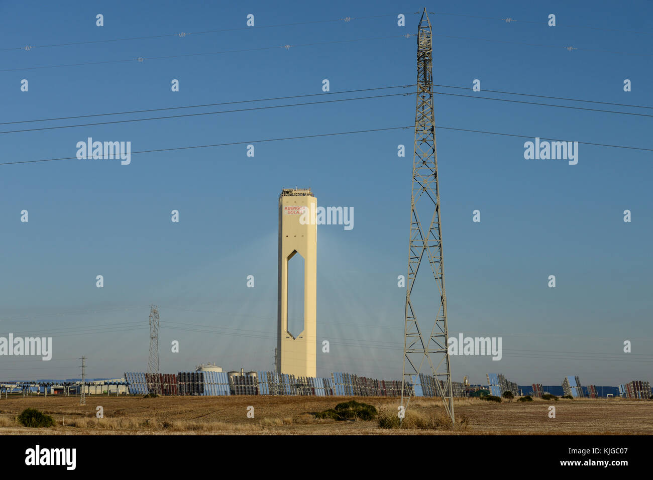 Spain, Seville, Sanlucar la Mayor, Solnova solar power station with flat heliostats and tower PS10 and PS20 by company Abengoa Stock Photo