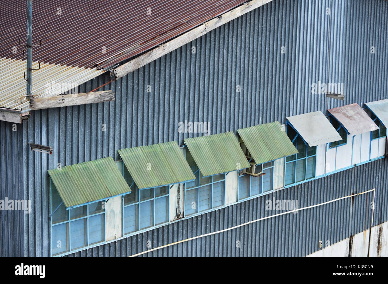 Corrugated Iron warehouse on dock at Papua New Guinea. Stock Photo