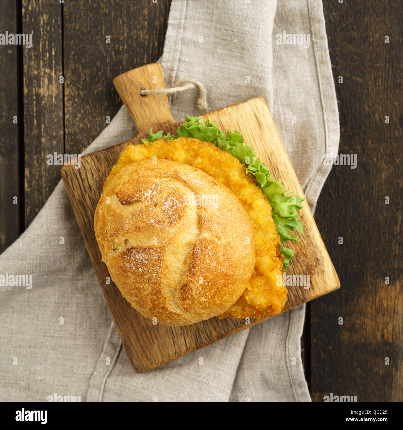 Bread roll with breaded chicken escalope Stock Photo Alamy