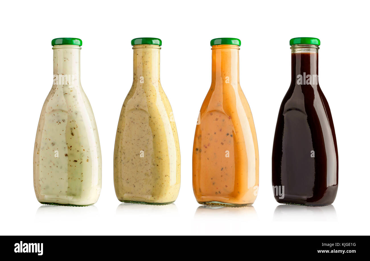 set of barbecue sauces in glass bottles on white background Stock Photo