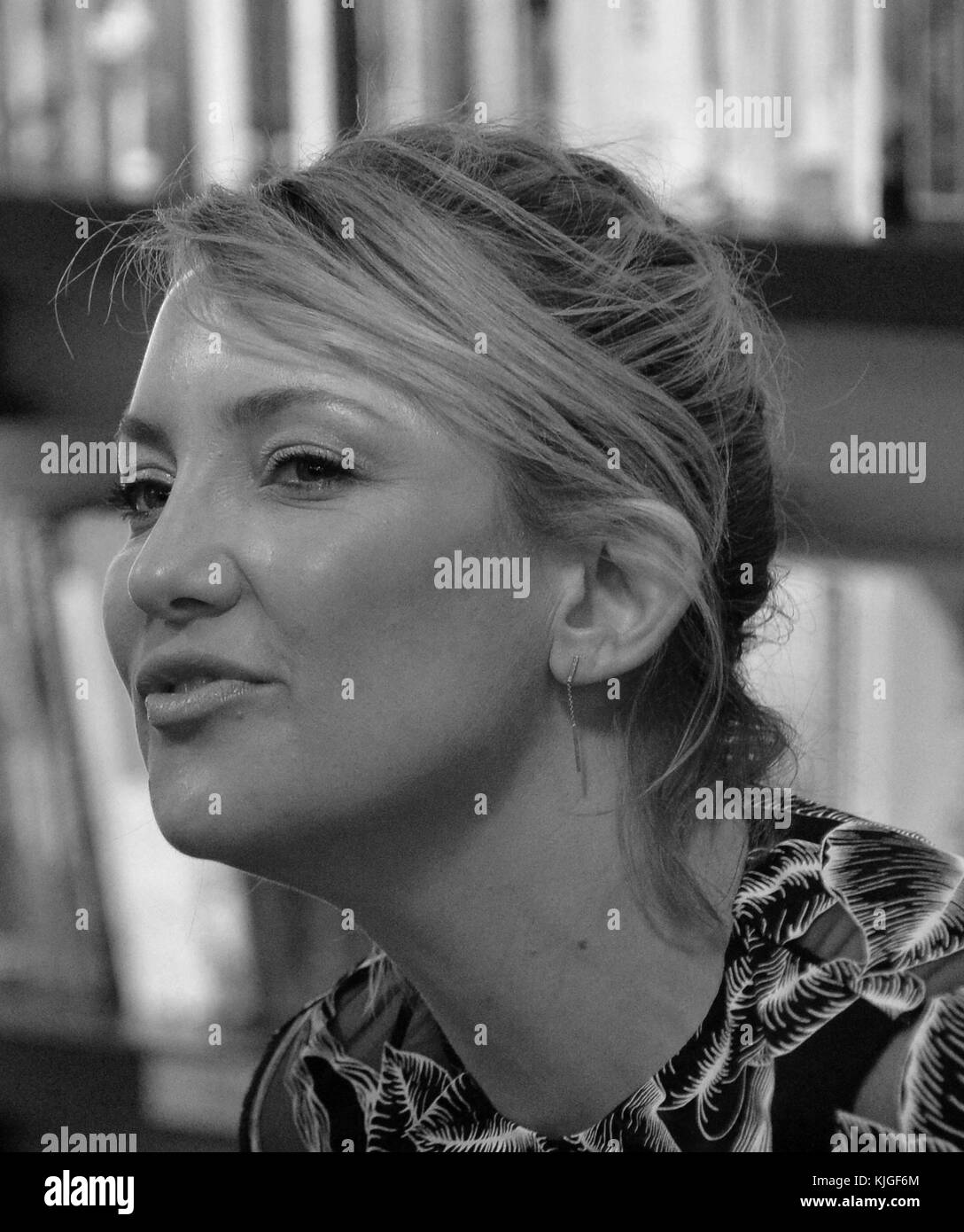 Actress kate hudson signs copies of her book pretty happy Black and ...