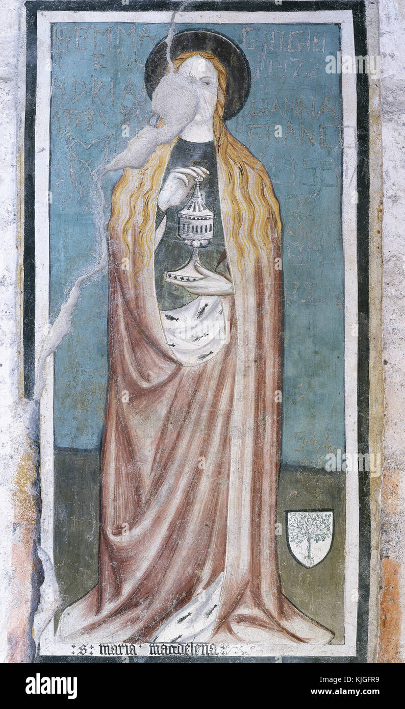 Mary Magdalene or Mary of Magdala. Jewish woman who traveled with Jesus as one of his followers. She is said to have witnessed Jesus' crucifixion and resurrection. The Magdalene with a box of ointment in her hands. Fresco. 15th century. St. Mary Chapel. Benedictine Abbey of Novalesa. Turin. Italy. Stock Photo