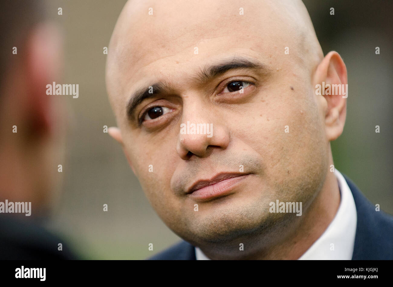 Sajid Javid MP (Con; Secretary of State for Communities and Local Government) on College Green, Westminster, discussing Philip Hammonds budget, 22nd N Stock Photo