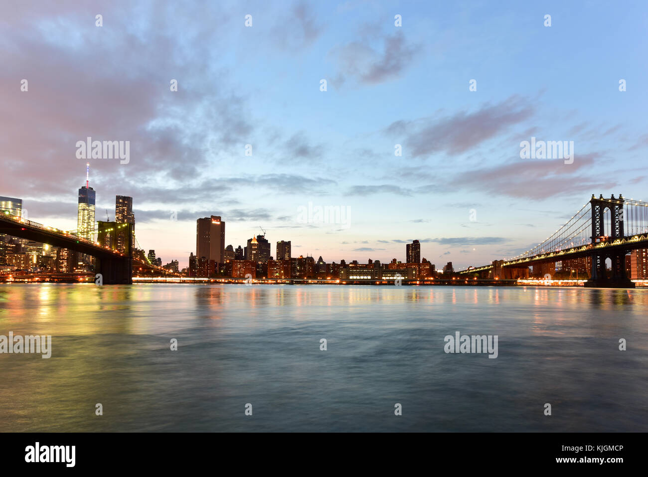 View of the Brooklyn Bridge and Manhattan Bridge at sunset from ...