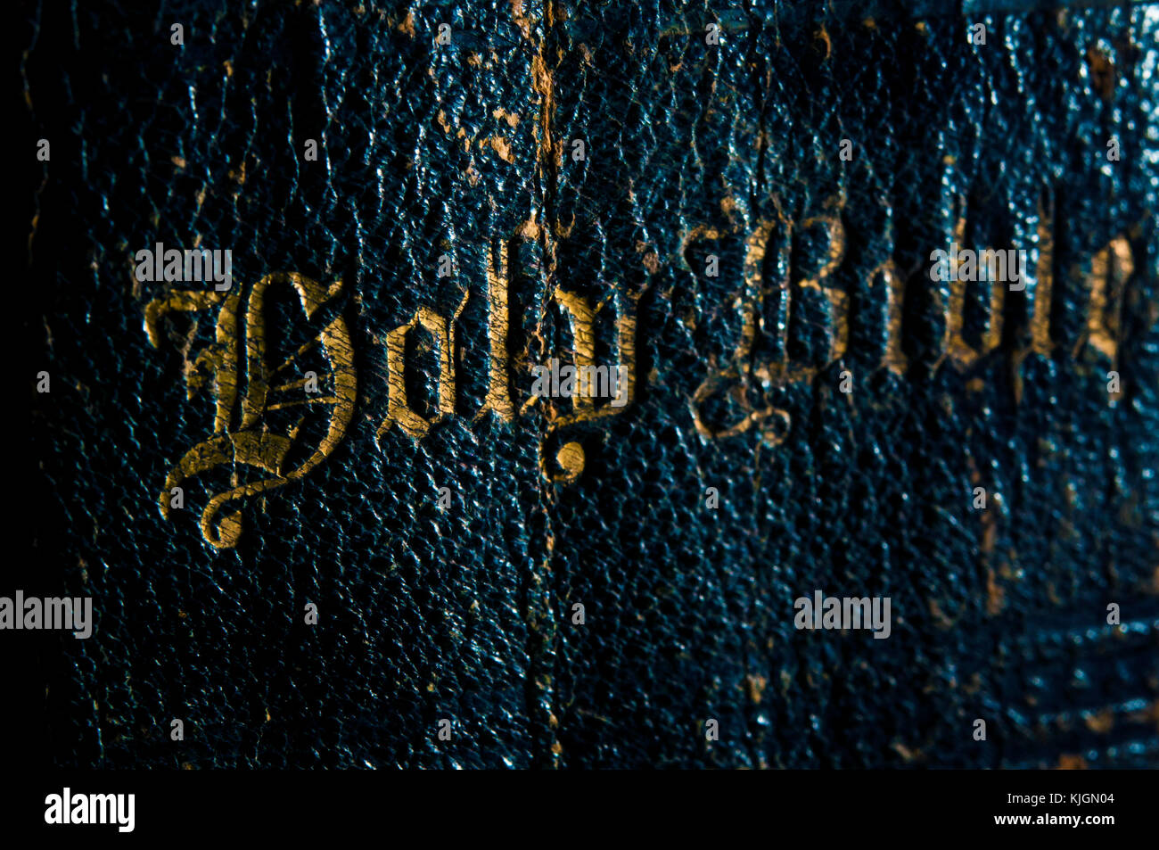 very old Holy Bible spine with gold letterings Stock Photo